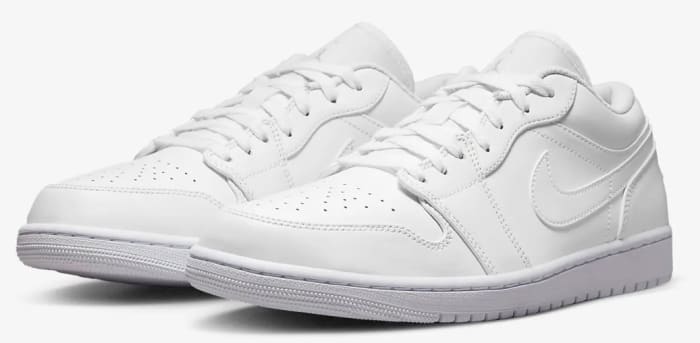 View of white Air Jordan shoes.